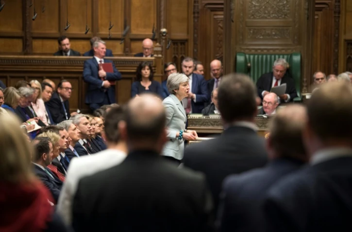 La Première ministre britannique Theresa May (c) au Parlement, le 25 mars 2019 à Londres