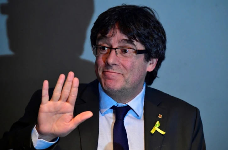 Photo archive du 7 avril 2018 montrant le leader indépendantiste catalan Carles Puigdemont au cours d'une conférence de presse à Berlin