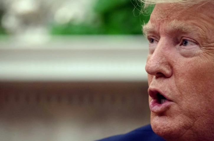 Le président américain Donald Trump s'exprime depuis le Bureau ovale, le 11 septembre 2019  