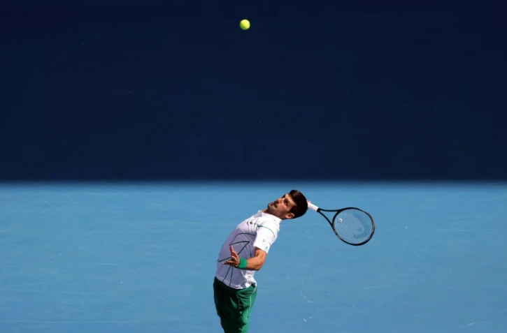 Le Serbe Novak Djokovic face à l'Argentin Diego Schwartzman en 8e de finale de l'Open d'Australie, à Melbourne, le 26 janvier 2020