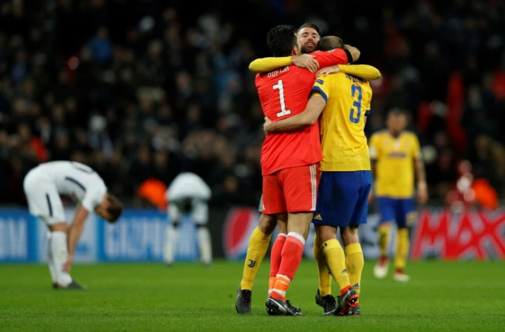 La joie des joueurs de la Juventus Gianluigi Buffon, Andrea Barzagli et Giorgio Chiellini, après la victoire contre Tottenham et la qualification en quarts de finale, le 7 mars 2018 à Wembley 