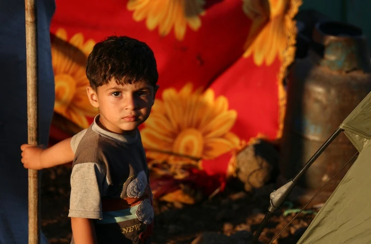 Un enfant syrien déplacé dans le camp de réfugiés de Quneitra, près de la frontière israélienne, le 1er juillet 2018