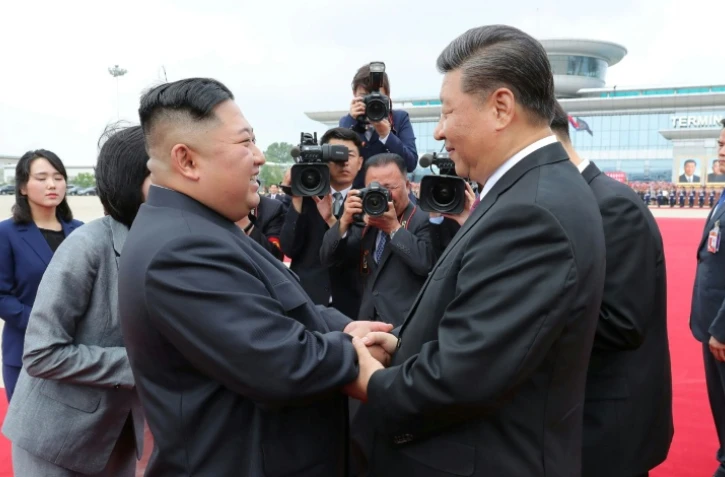 Kim Jong Un et Xi Jinping à Pyongyang, le 21 juin 2019