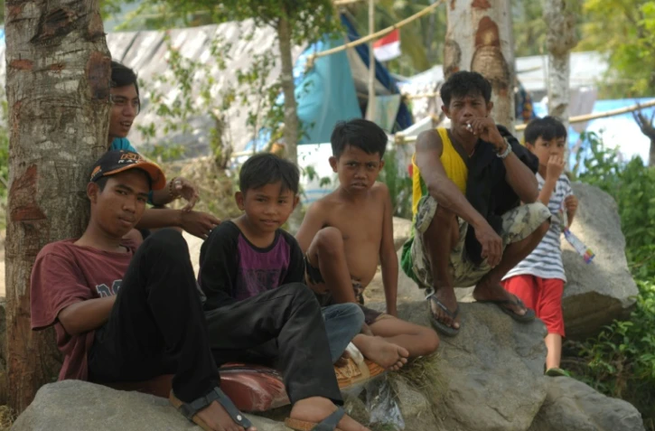 Des indonésiens dans un refuge à Palu, en indonésie, le 26 octobre 2018, près d'un mois après le passage d'un tsunami dévastateur