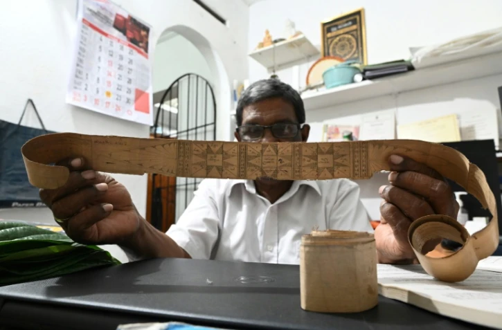 L'astrologue Dayasena Athukorale le 13 avril 2022 à Makola, près de Colombo