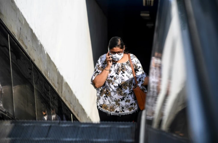 Une femme portant un masque à New Delhi, le 12 septembre 2020