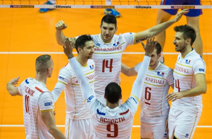 Les Français fêtent un point pendant leur match face à la Russie, le 6 janvier 2016 lors du tournoi de qualification olympique de Berlin