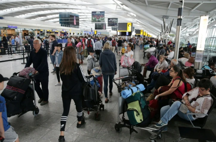 Des passagers à l'aéroport Heathrow de Londres, le 29 mai 2017