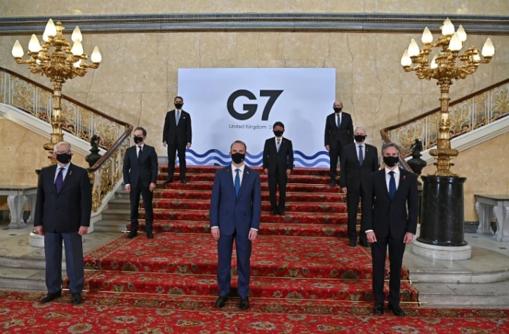 Photo de famille des ministres des Affaires étrangères du G7: Josep Borreill pour l'Europe (g, l'Allemand Heiko Maas (2e g), l'Italien Luigi Di Maio (3e g), le Britannique Dominic Raab (4e g), le Japonais Toshimitsu Motegi (5e g), le Français Jean-Yves Le Drian, le Canadien Marc Garneau (7e g) et l'Américain Antony Blinken (8e g), le 4 mai 2021 à Londres