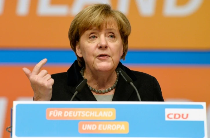 La chancelière allemande Angela Merkel s'adresse aux membres de son parti le CDU à Karlsruhe, le 14 décembre 2015