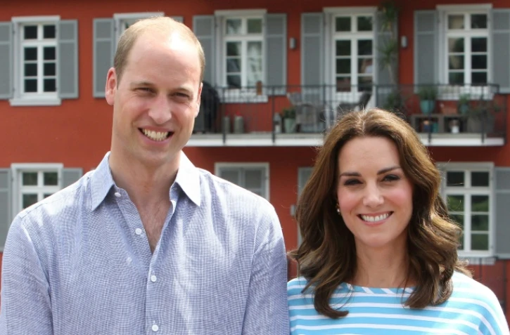 Le prince William (g) et son épouse Kate, le 20 juillet 2017 à Heidelberg en Allemagne