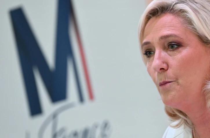 Marine Le Pen, candidate du Rassemblement national à la présidentielle, lors d'une conférence de presse à Paris le 13 avril 2022