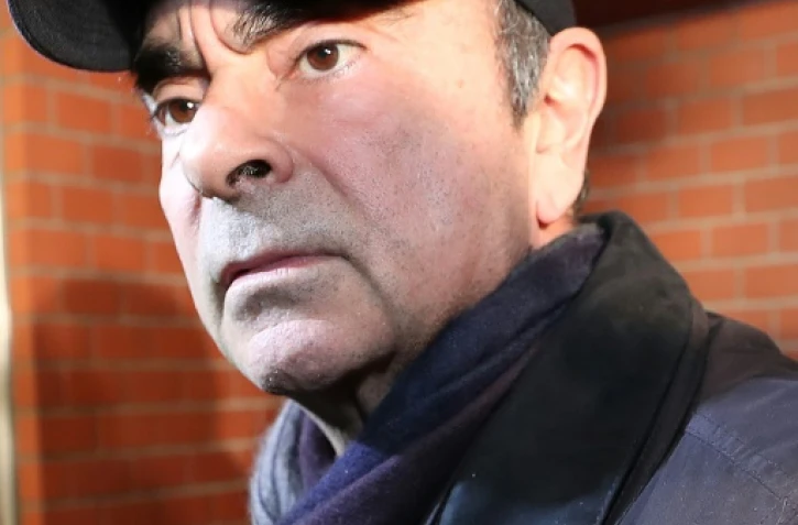 Carlos Ghosn à son arrivée à sa résidence de Tokyo, le 8 mars 2019