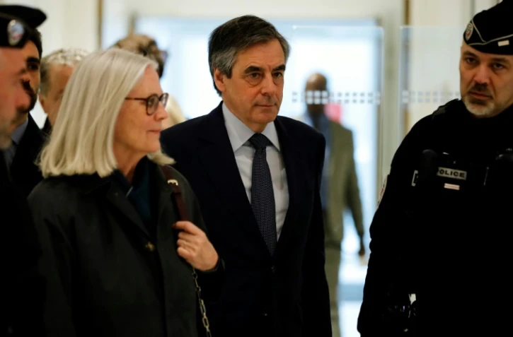 L'ancien Premier ministre François Fillon et son épouse Pénélope Fillon arrivent au tribunal de Paris, le 10 mars 2020