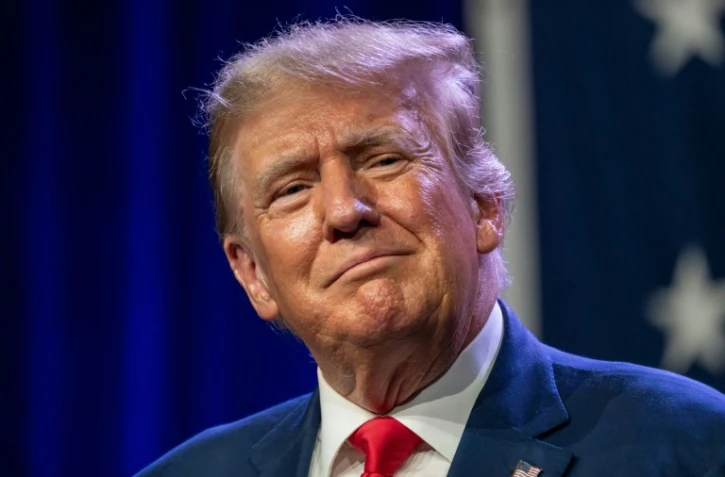 L'ancien président américain Donald Trump, le 28 juillet 2023 pendant un dîner du Parti Républicain à Des Moines, dans l'Iowa