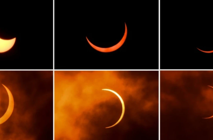 Cette combinaison de photos montre la Lune se déplaçant devant le Soleil, lors d'une éclipse annulaire, au moment du solstice d'été, observée à New Delhi le 21 juin 2020