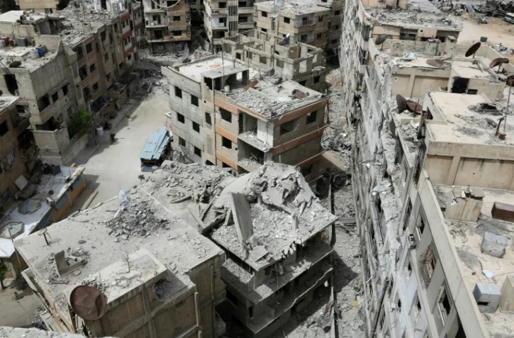 Les destructions dans la ville syrienne de Douma reprise aux rebelles par le régime et où une attaque présumée chimique a eu lieu, le 17 avril 2018