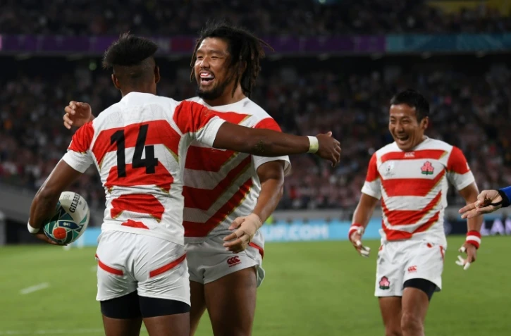 La joie des Japonais après un essai face à la Russie, en match d'ouverture de la Coupe du monde, le 20 septembre 2019 à Tokyo