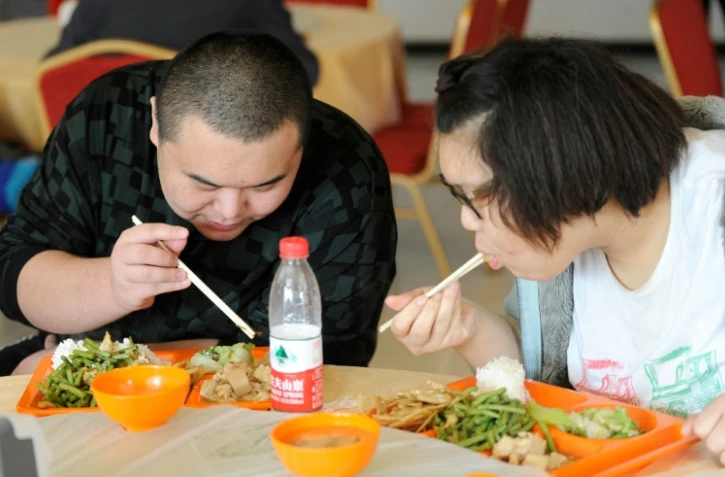 Des jeunes chinois dans un centre diététique le 11 novembre 2011 à Pekin