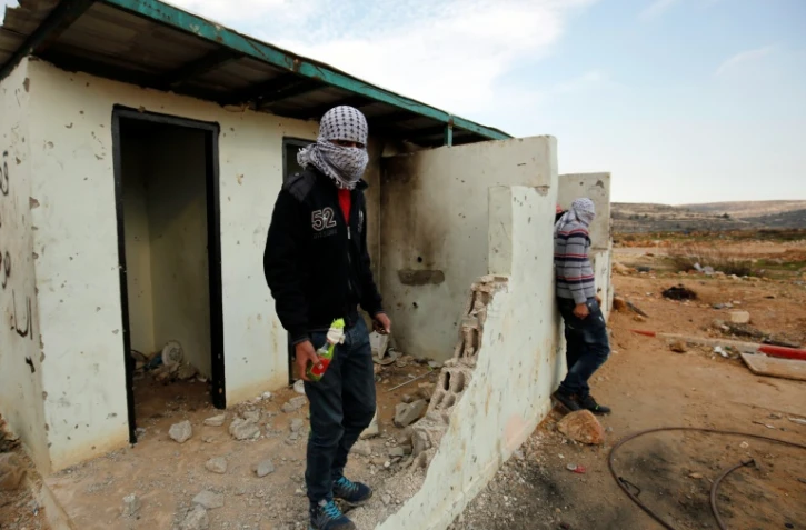 Manifestants palestiniens le 12 décembre 2015 à al-Bireh près de Ramallah