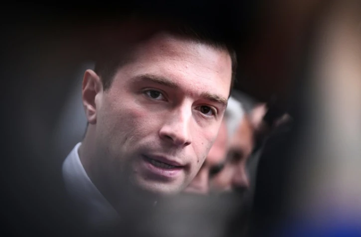 Le président du Rassemblement national Jordan Bardella lors d'une visite au salon de la défense Eurosatory à Villepinte (Seine-Saint-Denis), en banlieue parisienne le 19 juin 2024  