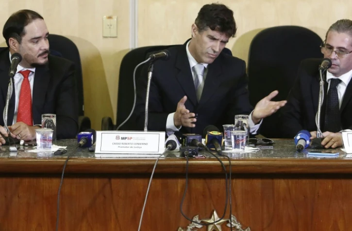 Les procureurs Fernando Henrique de Moraes Araujo, Cessio Roberto Conserino et Jose Carlos Blat, lors d'une conférence de presse le 10 mars 2016 à Sao Paulo