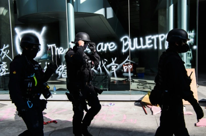 Des policiers dans le campus de l'université polytechnique de Hong Kong, le 28 novembre 2019