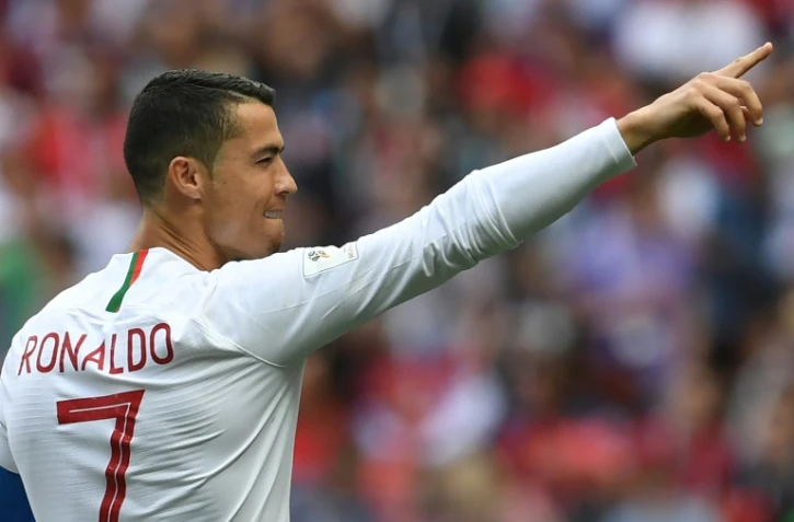 L'attaquant du Portugal Cristiano Ronaldo exulte après avoir inscrit un but face au Maroc au Mondial-2018 au stade Loujniki, le 20 juin 2018 à Moscou  