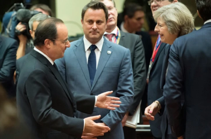 Le président Hollande et la Première ministre britannique Theresa May pendant le sommet européen à Bruxelles le 20 octobre 2016
