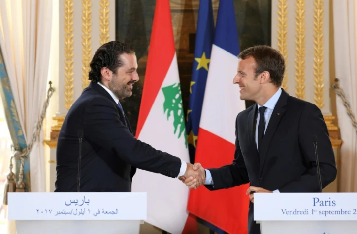 Le président français Emmanuel Macron (D) et Saad Hariri lors de la visite du Premier ministre libanais à Paris, le 1er septembre 2017