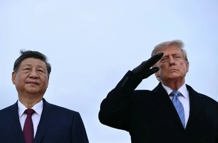 Le président américain Donald Trump accueille son homologue chinois Xi Jinping à son arrivée à Joint Base Andrews, dans le Maryland (est), le 23 septembre 2026