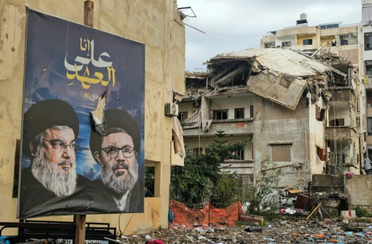 Un quartier de la banlieue sud de Beyrouth touché dans la nuit par des frappes israéliennes, le 14 mars 2026
