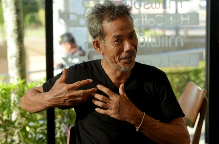 Le commandant Chaiyananta Peeranarong, ancien commando de marine thaïlandais, qui a pris part à l'évacuation des 12 enfants et de leur entraîneur de foot bloqués dans une cave inondée, lors d'un entretien avec l'AFP le 11 juillet 2018.