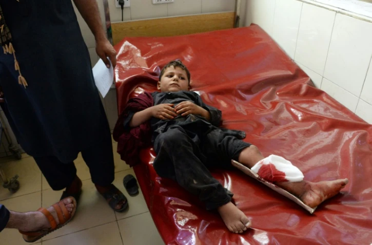 Un enfant afghan à l'hôpital de Jalalabad après une série d'explosions dans la ville afghane, le 11 septembre 2018