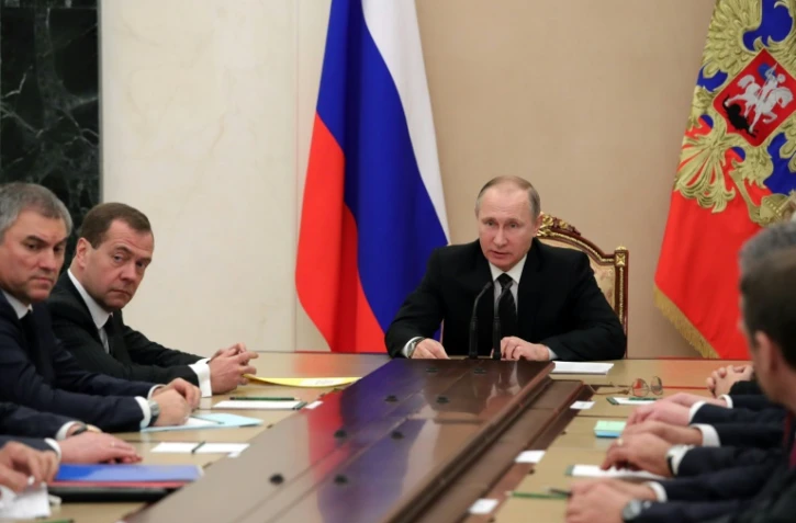 Le président Vladimir Poutine lors d'une réunion du conseil russe de sécurité le 28 décembre 2016 au Kremlin à Moscou