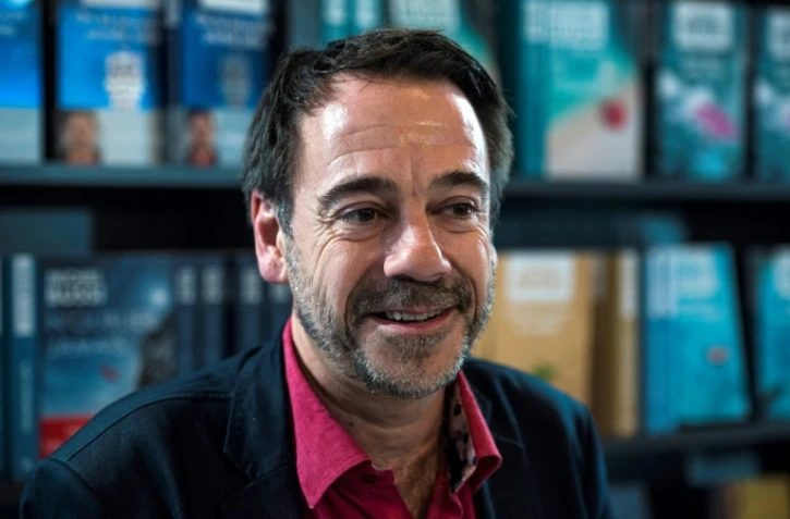L'écrivain français Michel Bussi, le 11 octobre 2017 à Francfort en Allemagne