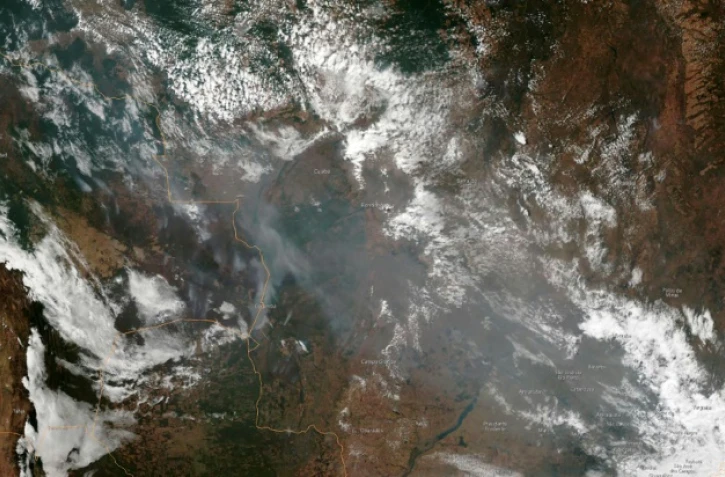 Image satellite transmise par la NOAA (agence Nationale de l'administration atmosphérique et océanique) montrant les fumées des feux en Amazonie, le 21 août 2019