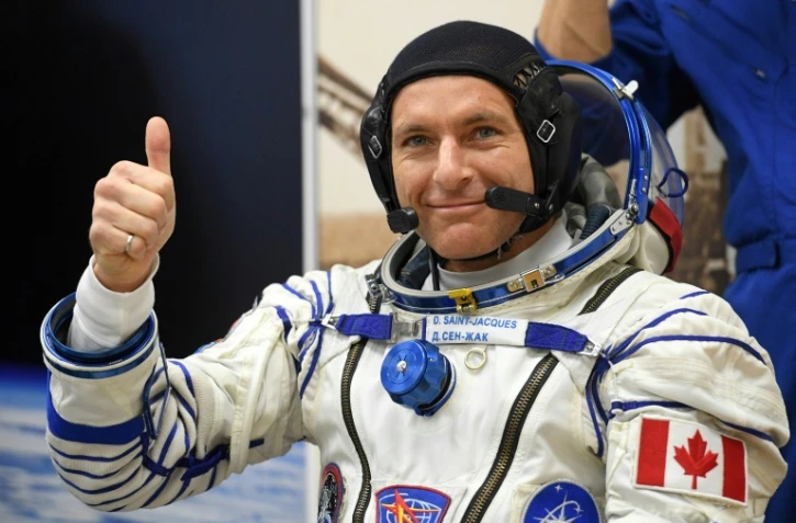 L'astronaute canadien David Saint-Jacques essaye sa combinaison avant son départ pour l'ISS, le 3 décembre 2018 à Baïkonour, au Kazakhstan