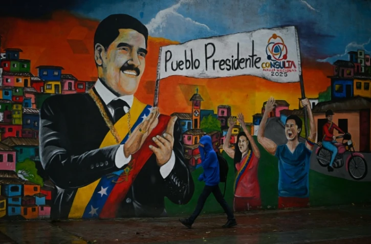 Une fresque murale représentant l'ancien président vénézuélien Nicolas Maduro à Caracas, le 13 mai 2026