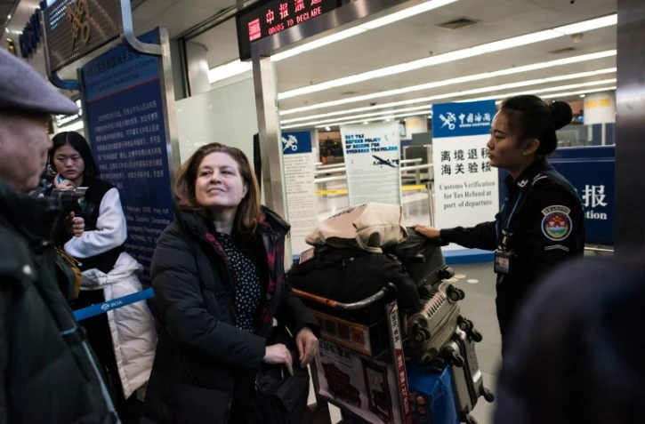 La correspondante en Chine de l'hebdomadaire français L'Obs, Ursula Gauthier, le 31 décembre 2015 à l'aéroport de Pékin