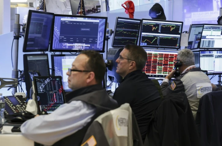 Des opérateurs à la Bourse de New York, le 30 octobre 2025