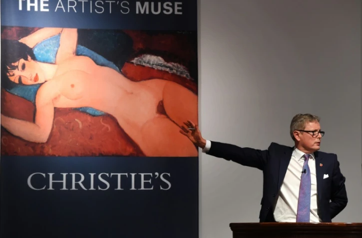 Le "Nu couché" de Modigliani adjugée  170,4 millions de dollars par Jussi Pylkkanen le 9 novembre 2015 à New York
