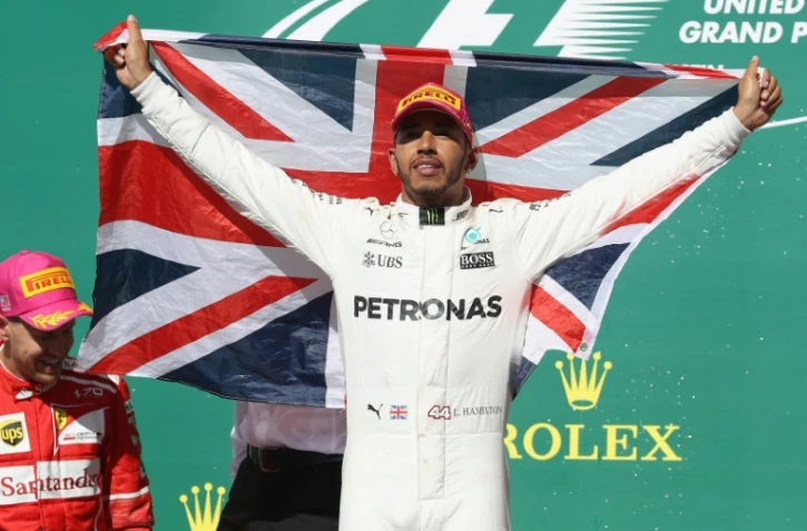 Le Britannique Lewis Hamilton pose sur le podium après sa victoire au GP des Etats-Unis, le 22 octobre 2017 à Austin 