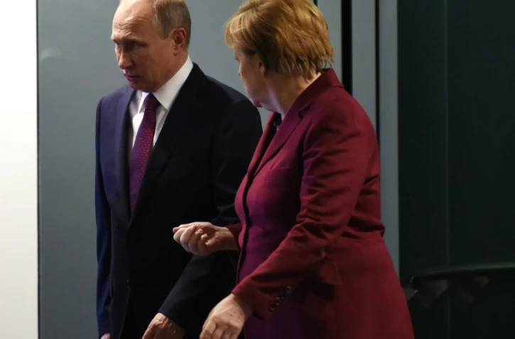 Le président Vladimir Poutine et la chancelière allemande Angela Merkel le 19 octobre 2016 à Berlin