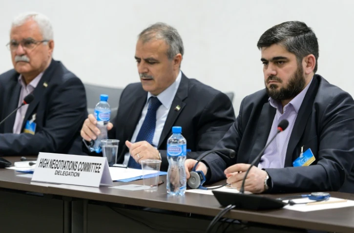 Des membres de l'opposition syrienne du HCN, George Sabra,  Asaad al-Zoabi et Mohammad Allouche le 15 avril 2016 à Genève