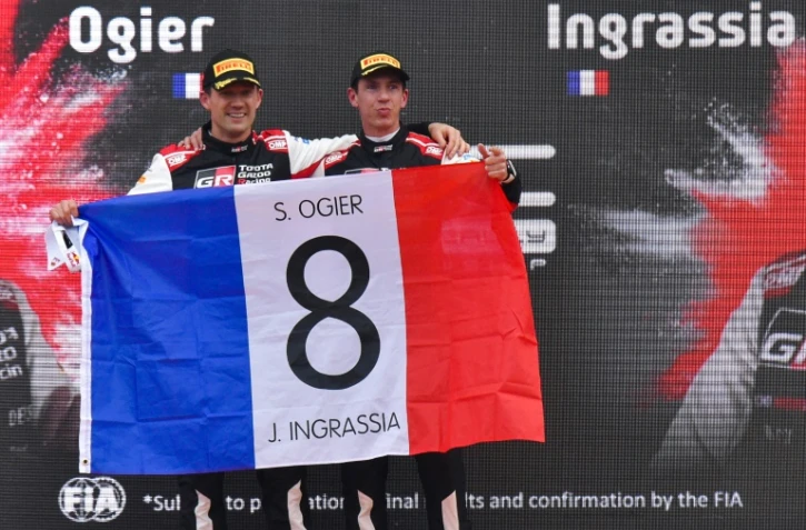 Le pilote français Sébastien Ogier et son co-pilote Julien Ingrassia, célèbrent leur 8e titre mondial, après avoir remporté le Rallye de Monza, le 20 novembre 2021