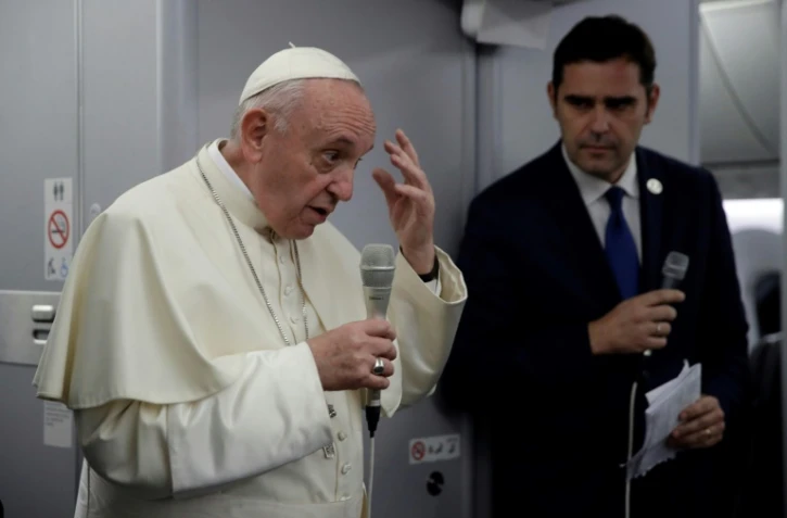 Le pape François parle aux journalistes à bord de l'avion le ramenant du Panama, le 27 janvier 2019
