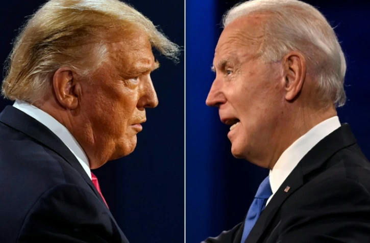 Photo montage avec Donald Trump (g) face à Joe Biden tous deux photographiés le 22 octobre 2020
