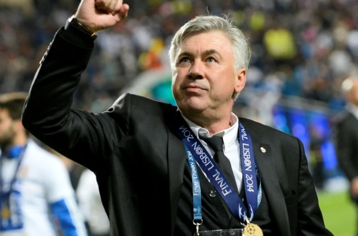 La joie de l'entraîneur italien du Real Madrid, Carlo Ancelotti, après la victoire face à l'Atlético Madrid, en finale de la Ligue des Champions, le 24 mai 2014 à Lisbonne