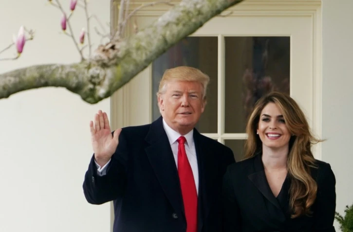 Le président américain Donald Trump (g) et sa proche conseillère Hope Hicks à Washington, le 29 mars 2018